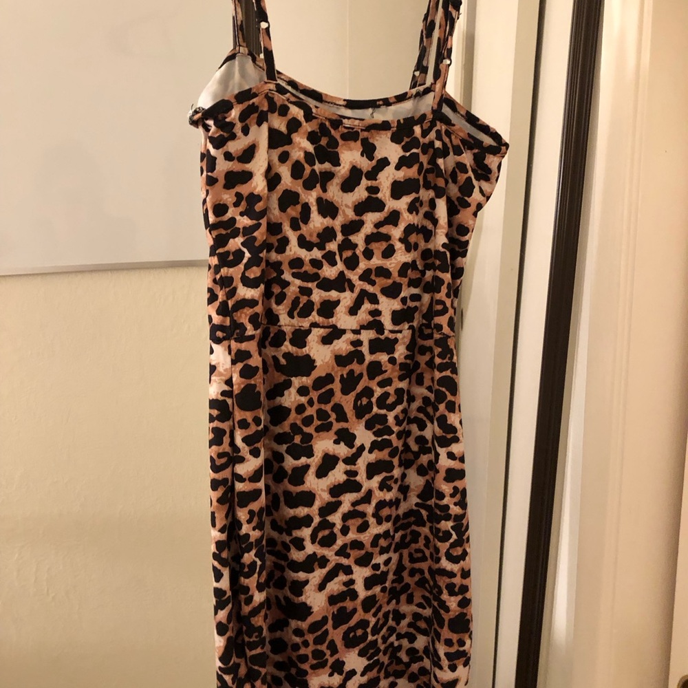 Leopard print sexy  mini fitted dress, 13 inches PTP, 26 inches long.